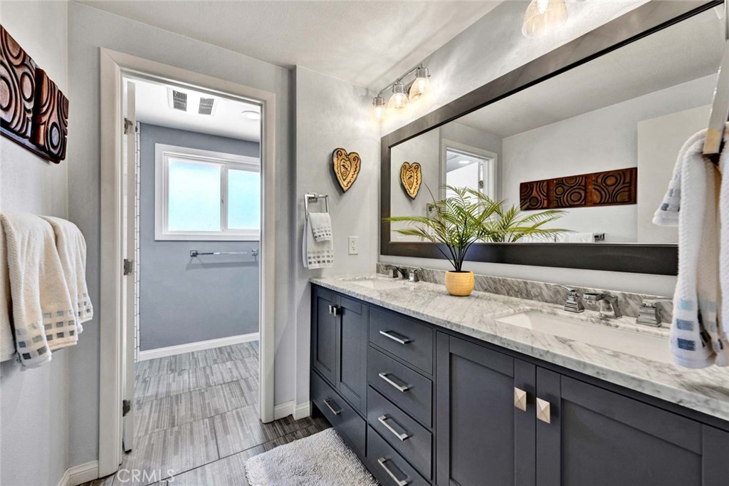 Secondary bath has been remodeled. - 18381 Serrano, Villa Park CA 92861 - photo 32