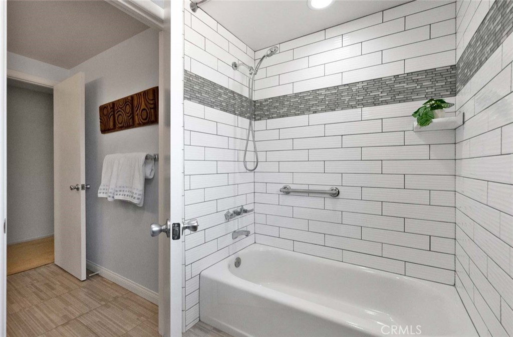 Tub with shower. - 18381 Serrano, Villa Park CA 92861 - photo 33