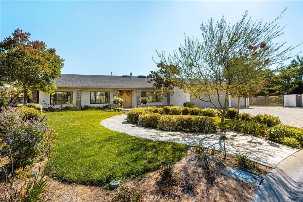 Front of Home with paver driveway, 3 car garage, Rv parking - 18581 Durfee, Villa Park CA 92861 - photo 1