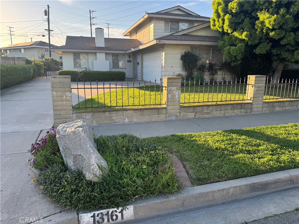 Nice house on large lot on a quiet cul de sac with great curb appeal and mature plants and trees - 13161 Summit Circle, Westminster CA 92683 - photo 1