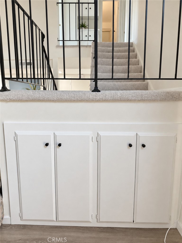 Storage under the stairway - 14155 Elystan Circle, Westminster CA 92683 - photo 7