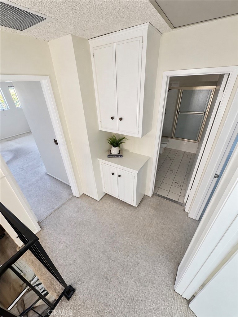 Upstairs lien closet - 14155 Elystan Circle, Westminster CA 92683 - photo 22