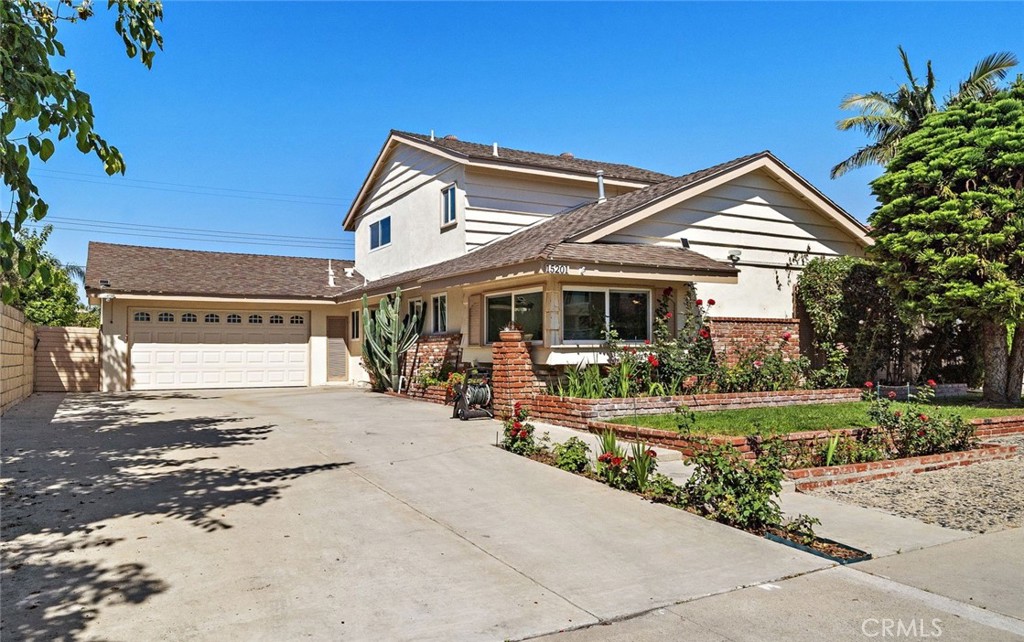 Spacious and well-maintained, this 5-bedroom plus bonus room home - 15201 Brighton Street, Westminster CA 92683 - photo 1