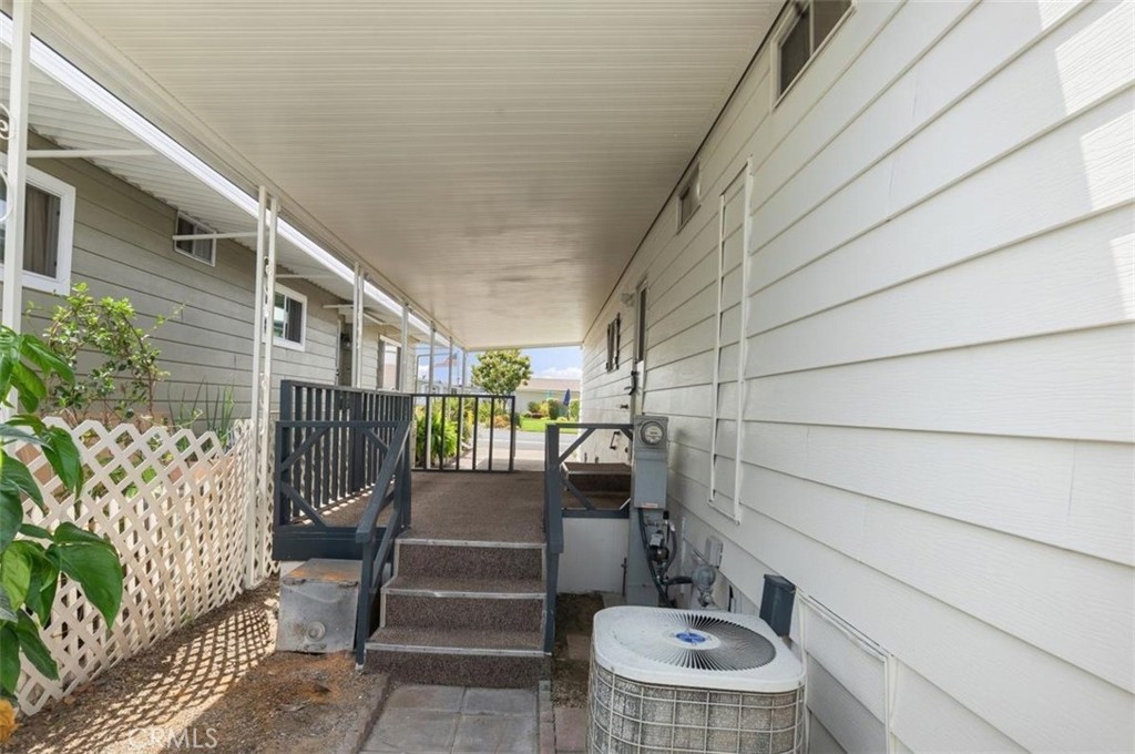 Covered Outdoor Space - 15621 Beach Blvd 103, Westminster CA 92683 - photo 3