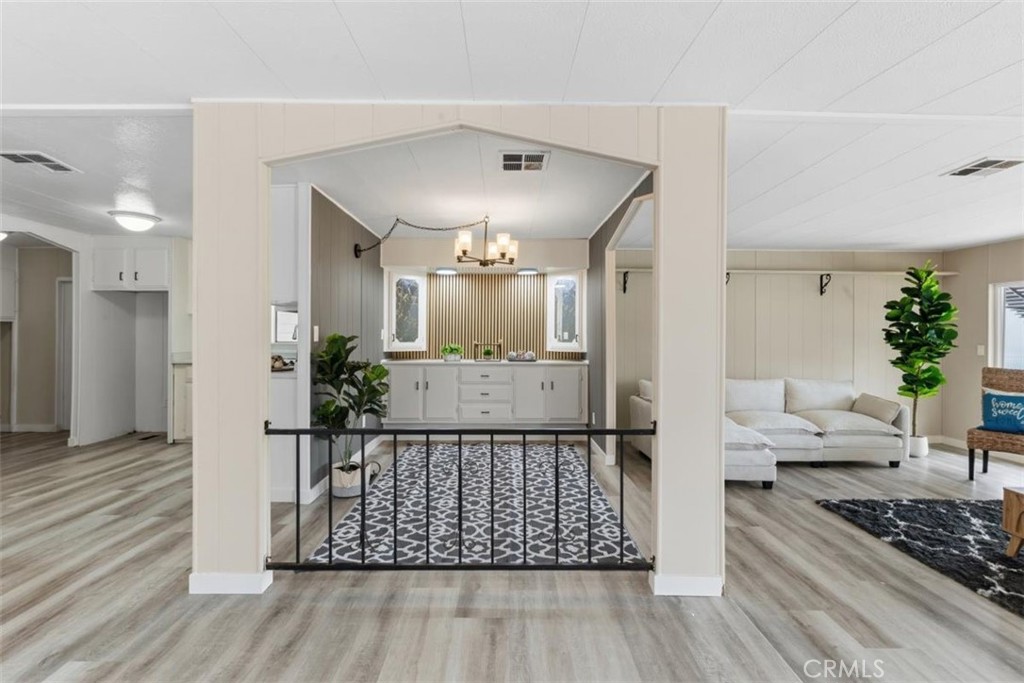 Open living area with dining space. - 15621 Beach Blvd 103, Westminster CA 92683 - photo 7