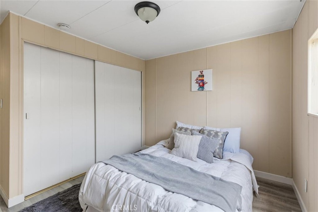 Bedroom with spacious closet. - 15621 Beach Blvd 103, Westminster CA 92683 - photo 15