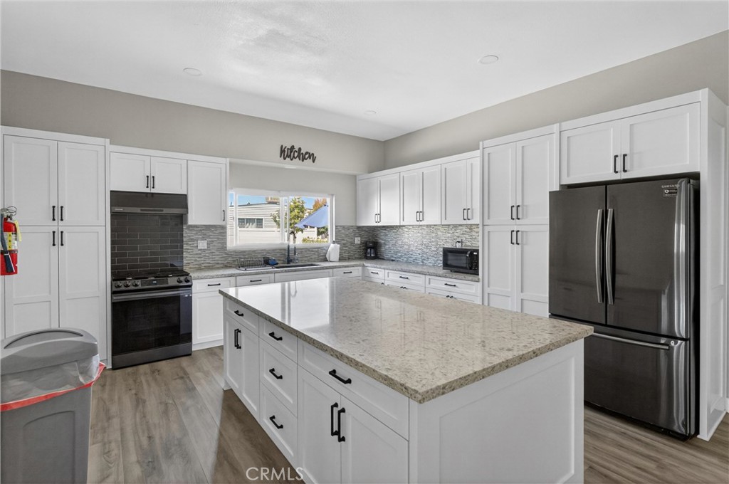 Clubhouse kitchen - 15621 Beach Blvd Spc 127, Westminster CA 92683 - photo 47