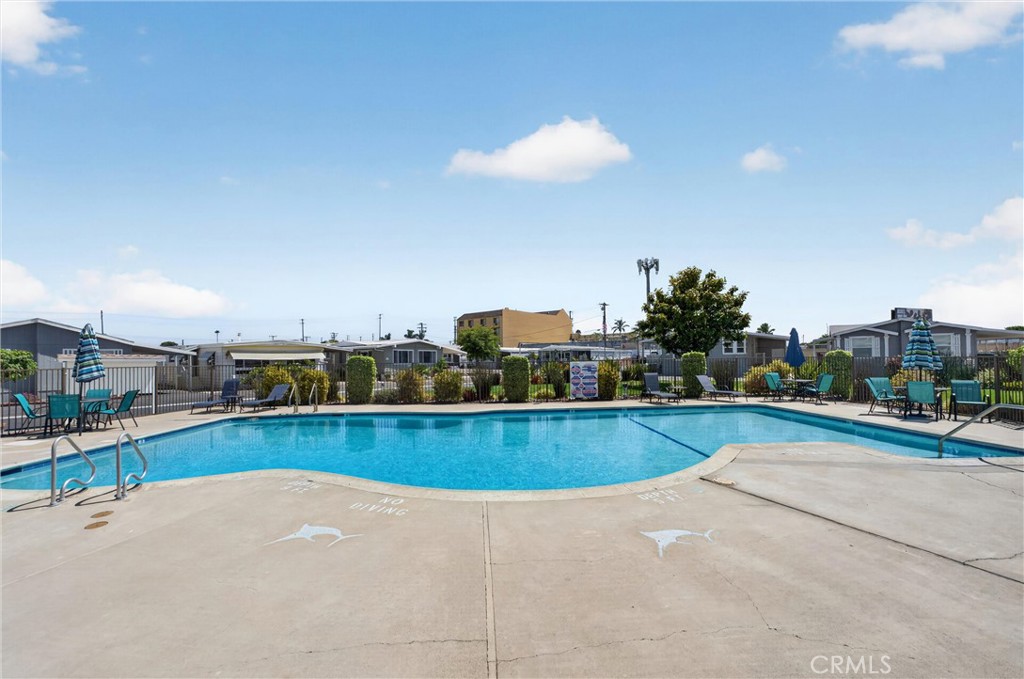 Community pool - 15621 Beach Blvd Spc 127, Westminster CA 92683 - photo 50