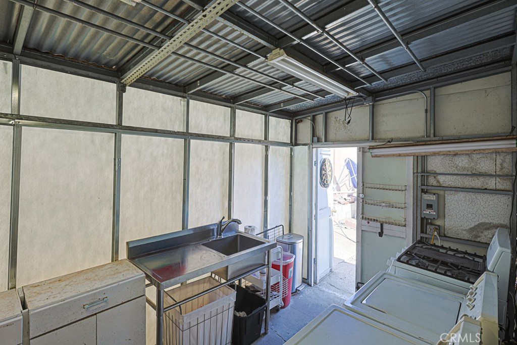 Outdoor Laundry Station and Kitchen. - 15621 Beach 24, Westminster CA 92683 - photo 36
