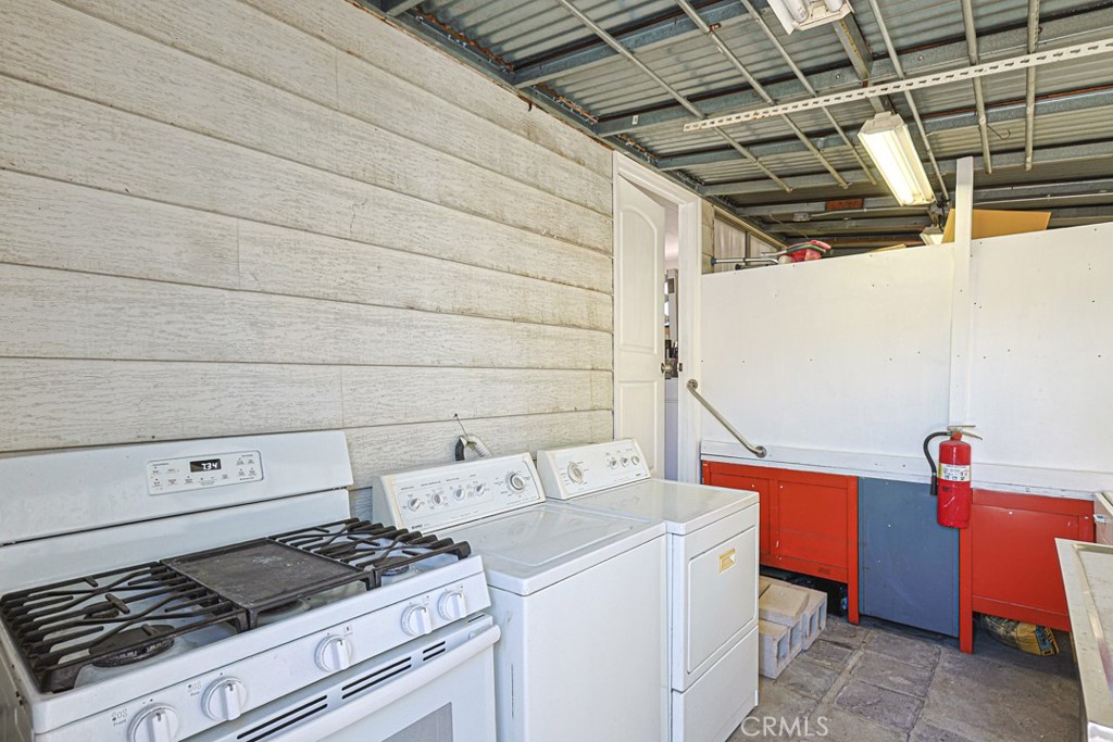 Outdoor Laundry Station and Kitchen. - 15621 Beach 24, Westminster CA 92683 - photo 37