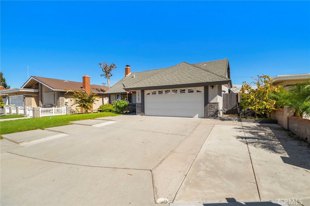 4 bedrooms, 4 bathrooms, and two primary suites, one on each level - 16102 Nelson Street, Westminster CA 92683 - photo 3