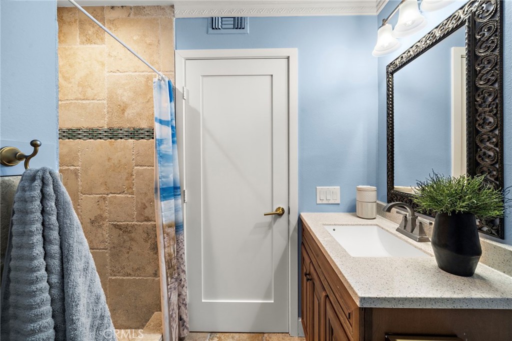 downstairs hall bathroom with walk in shower - 16102 Nelson Street, Westminster CA 92683 - photo 24