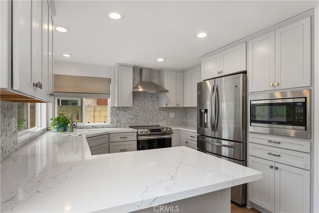 Remodeled kitchen - 5112 Kingscross, Westminster CA 92683 - photo 11