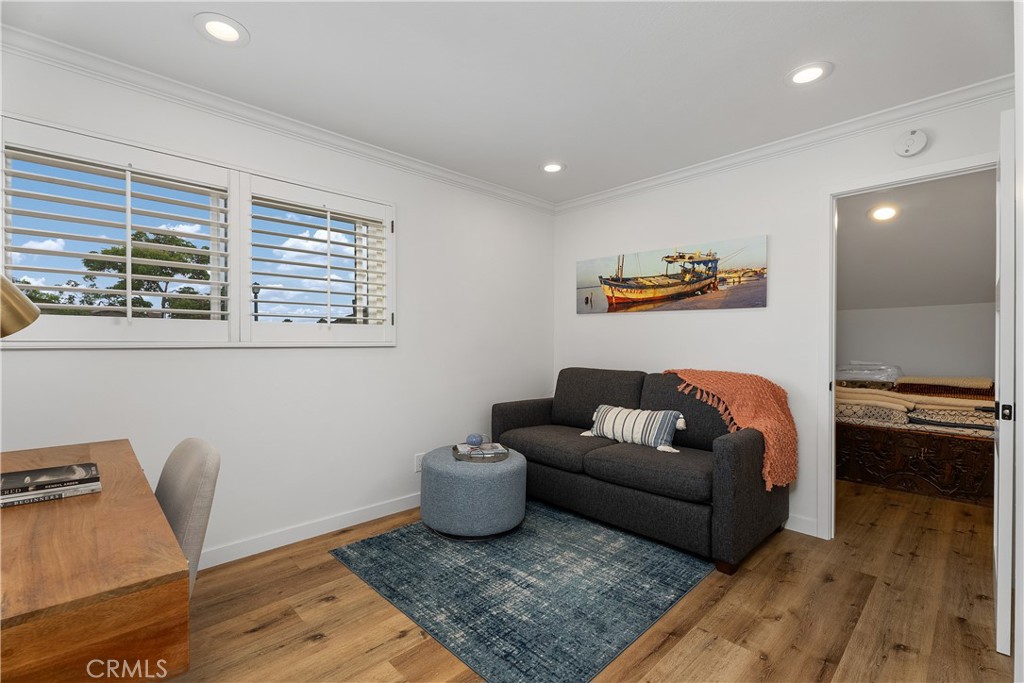 Second floor first bedroom with extra storage space over the garage - 5112 Kingscross, Westminster CA 92683 - photo 20