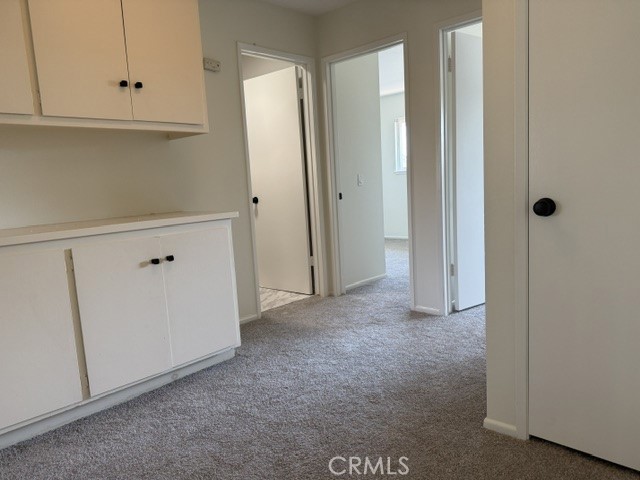 Storage cabinet upstairs hallway - 5281 Charing Cross Road, Westminster CA 92683 - photo 10