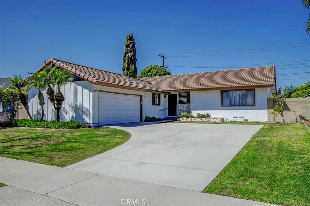 Front of house with large driveway, possibly room for RV - 5681 Norma, Westminster CA 92683 - photo 1