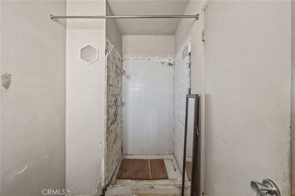 Primary Bathroom - currently unusable - 8441 Tulipwood Circle, Westminster CA 92683 - photo 26