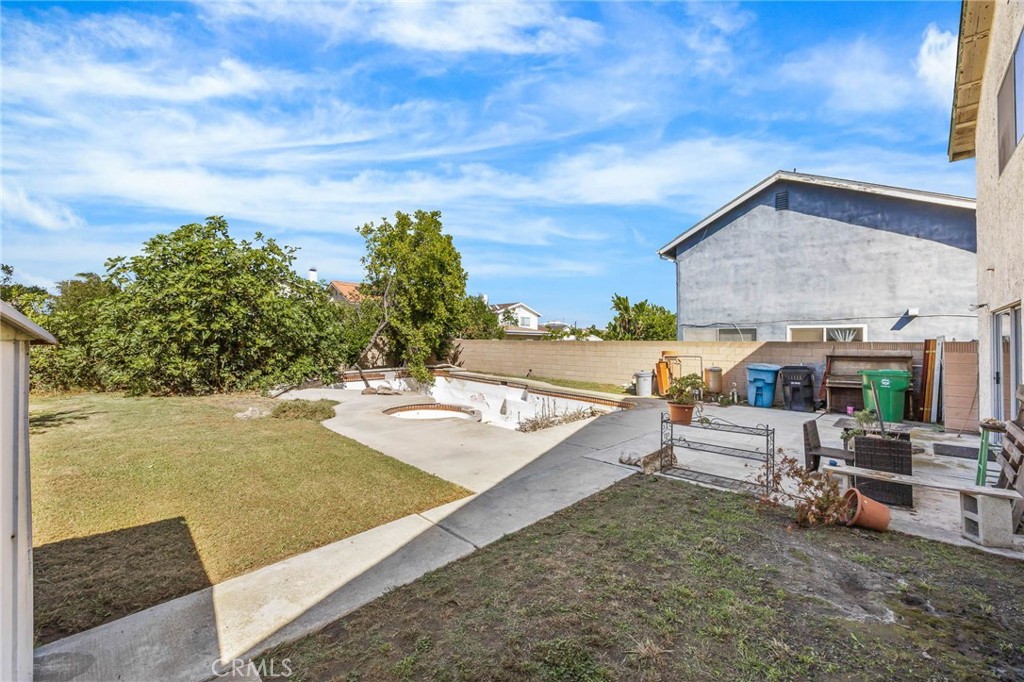 Backyard with Pool - currently unusable - 8441 Tulipwood Circle, Westminster CA 92683 - photo 33