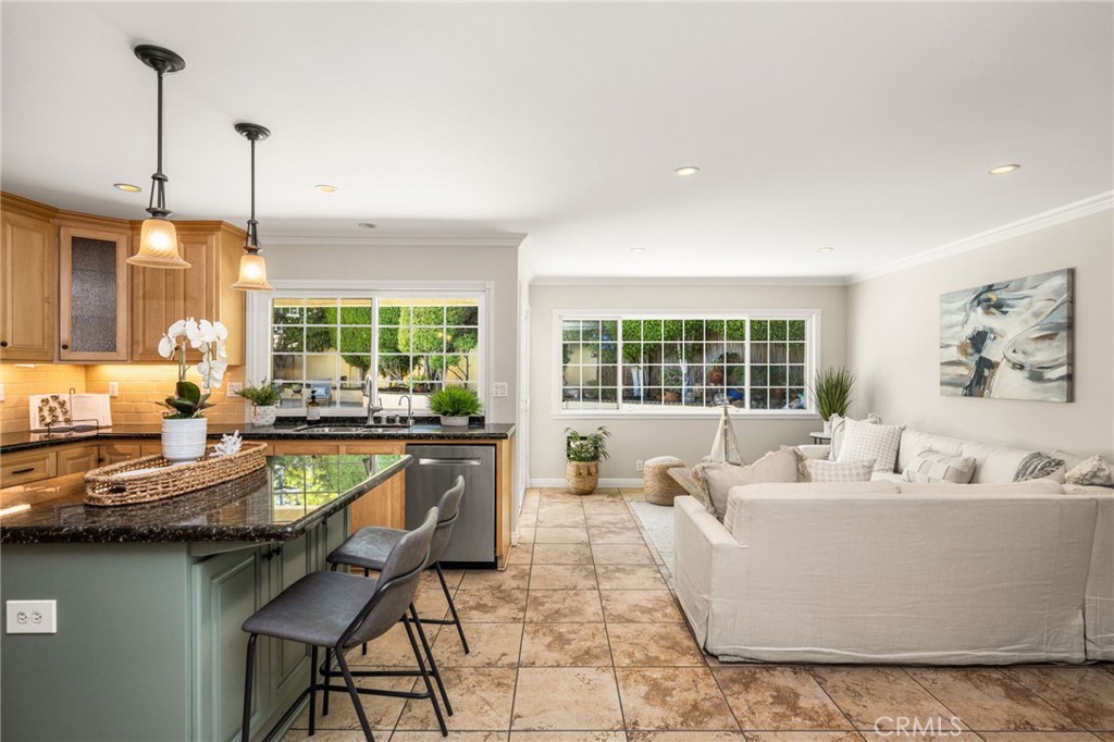 Open kitchen and family room layout. - 8981 Blackheath Circle, Westminster CA 92683 - photo 11
