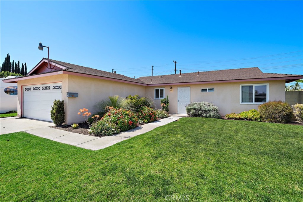 Charming Turnkey Single Story 3 BD, 1 BA, Home with TWO 2-Car Garages, Alley Access, RV Parking Pad, Large Backyard in G - 9051 Carnation Drive, Westminster CA 92683 - photo 1