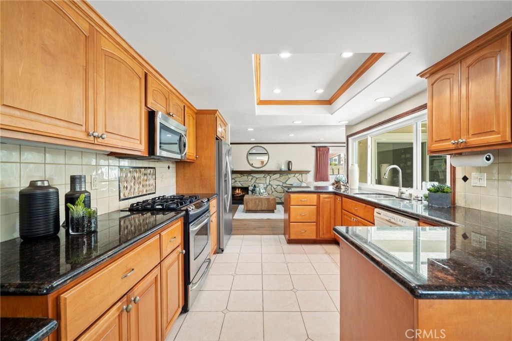 Remolded Kitchen has plenty of cabinet and counter space. Upgraded/Turnkey Ready - 9552 Westwood Drive, Westminster CA 92683 - photo 24