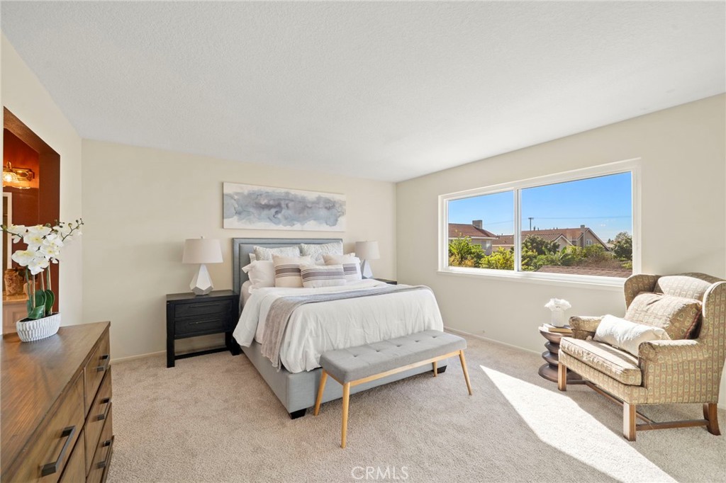 The primary suite boasts an exceptionally large bathroom with a built-in sit-down vanity, and a walk-in shower with sitt - 9552 Westwood Drive, Westminster CA 92683 - photo 29