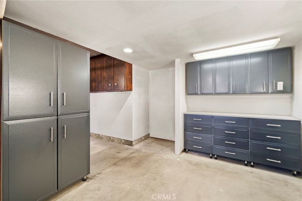The main level also includes a tastefully appointed half bath, a convenient inside laundry room, and direct access to th - 9552 Westwood Drive, Westminster CA 92683 - photo 46