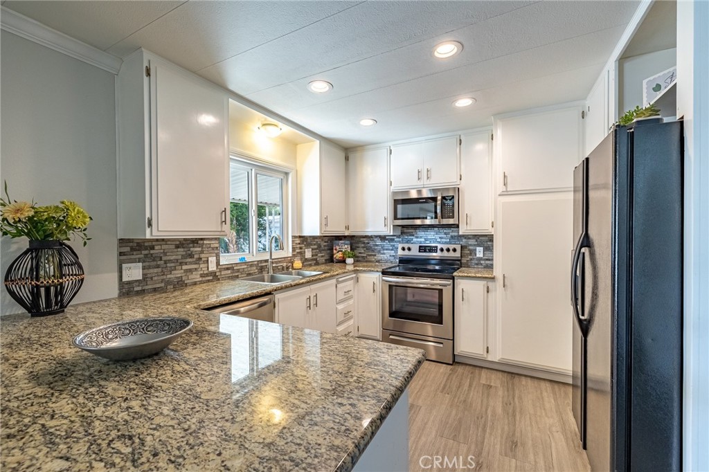 Beautiful kitchen with many cabinets for storage - 16757 Lake Terrace Way, Yorba Linda CA 92886 - photo 20