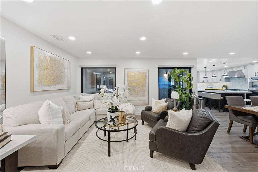 Family room with huge windows that look out to pool and yard. - 17052 El Cajon Avenue, Yorba Linda CA 92886 - photo 11