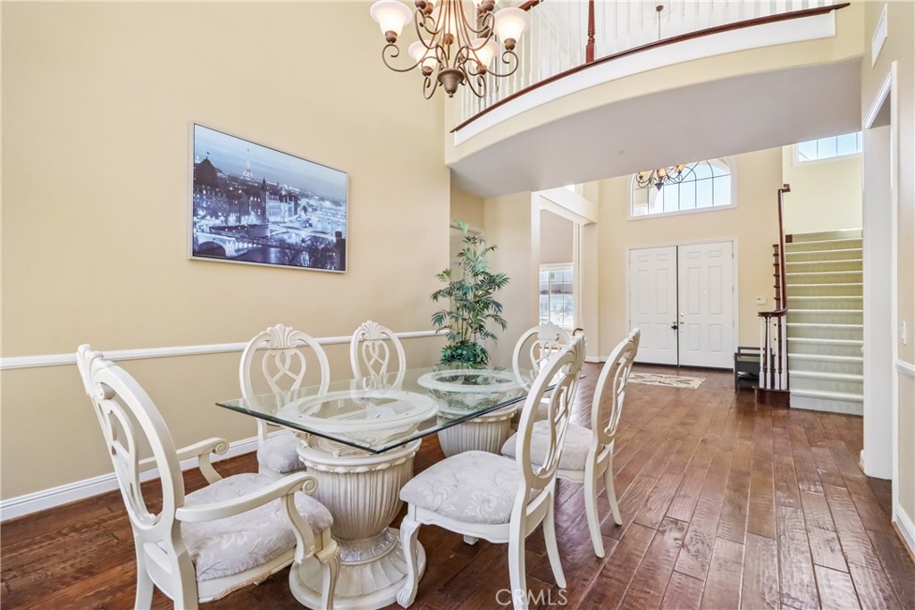 Dining area and view of front door, 2nd floor catwalk, stairs - 17218 Blue Spruce, Yorba Linda CA 92886 - photo 10