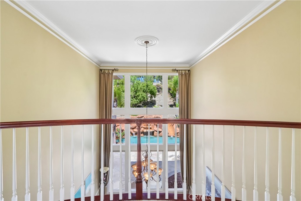 2nd floor catwalk with view to backyard rock pool - 17218 Blue Spruce, Yorba Linda CA 92886 - photo 37