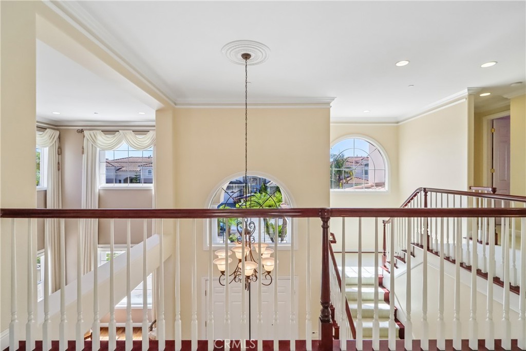 2nd floor catwalk with view to staircase #1, front door, and 1st floor family room - 17218 Blue Spruce, Yorba Linda CA 92886 - photo 38
