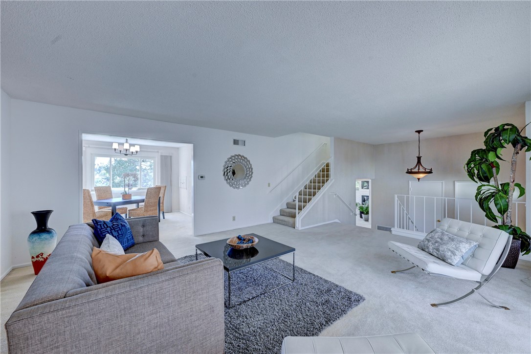 The formal living room, not the stairs to the upstairs bedrooms. - 19402 Old Ranch, Yorba Linda CA 92886 - photo 11