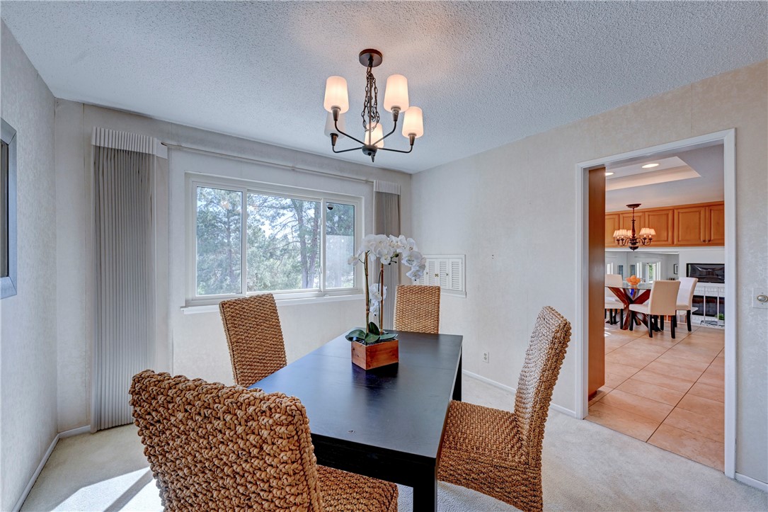 Formal dining room looking into the kitchen. - 19402 Old Ranch, Yorba Linda CA 92886 - photo 12
