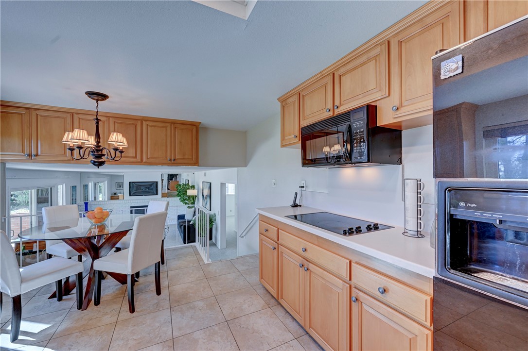 Spacious kitchen with kitchen nook. - 19402 Old Ranch, Yorba Linda CA 92886 - photo 14