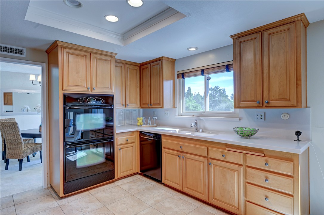 Double oven and easy care flooring in this updated kitchen. - 19402 Old Ranch, Yorba Linda CA 92886 - photo 15