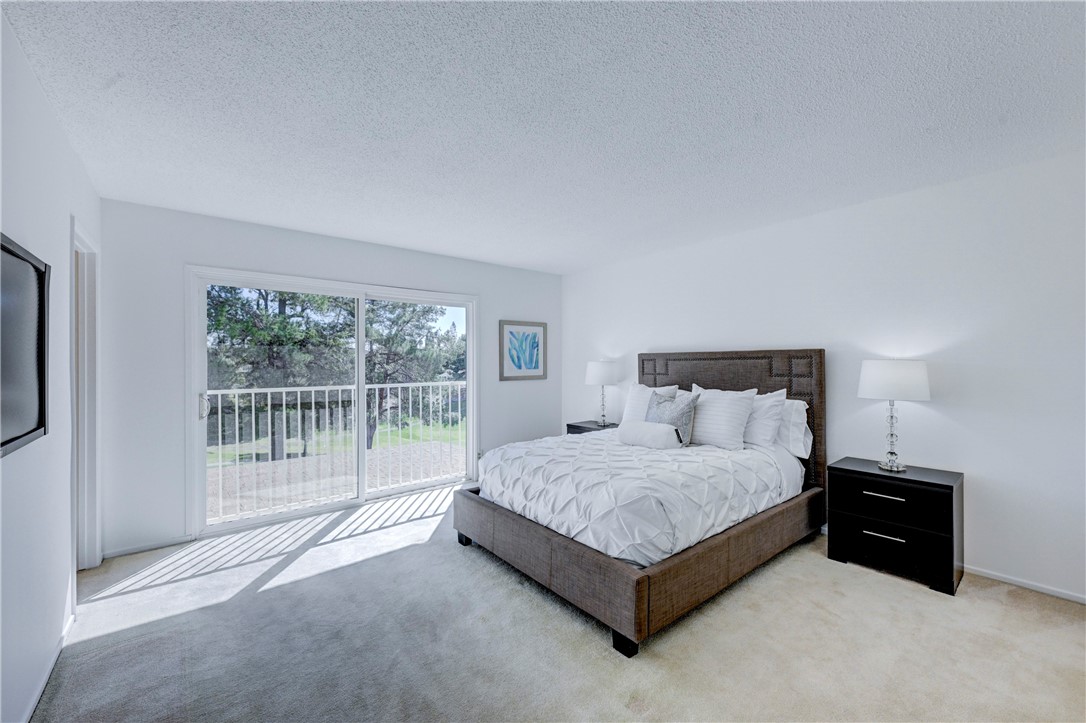 Primary suite has a slider with a great view of the green golf course. - 19402 Old Ranch, Yorba Linda CA 92886 - photo 22