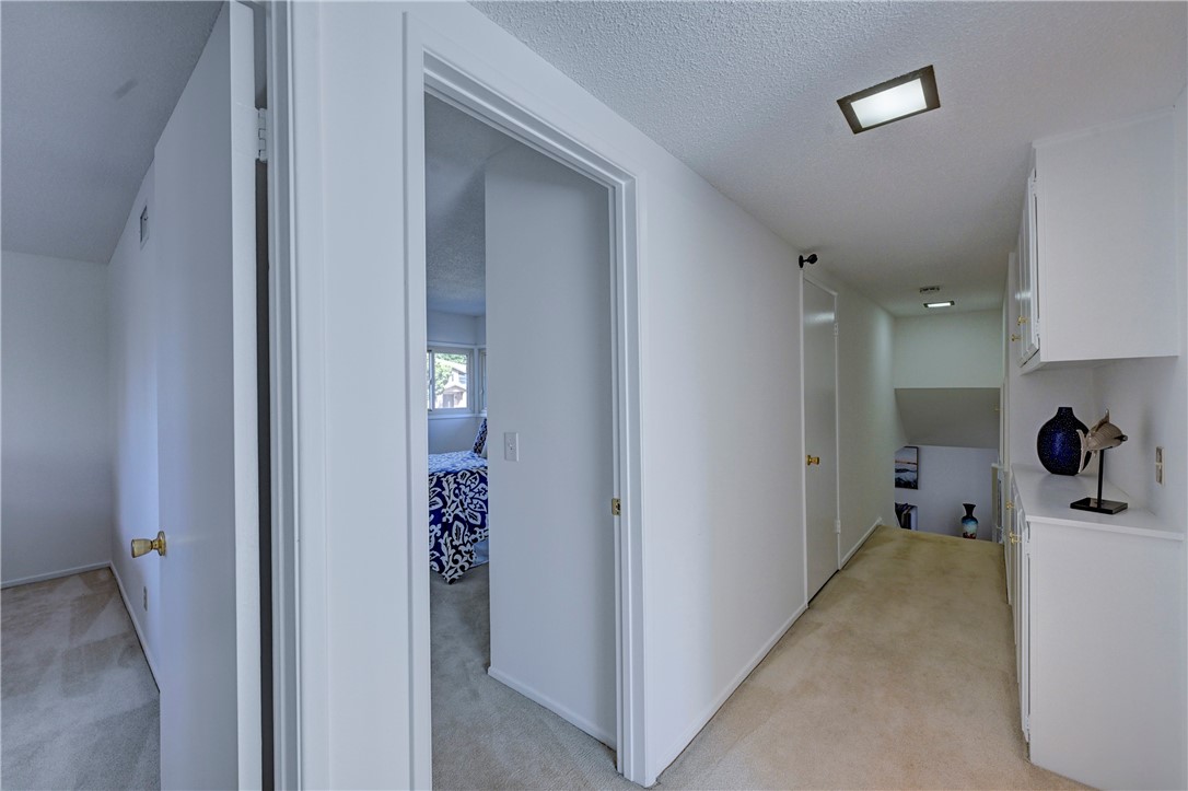 Upstairs hallway showing the two additional bedrooms. - 19402 Old Ranch, Yorba Linda CA 92886 - photo 30