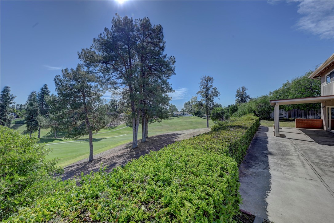 The backyard patio and view of the 12th fairway of the Yorba Linda Country Club golf course. - 19402 Old Ranch, Yorba Linda CA 92886 - photo 33