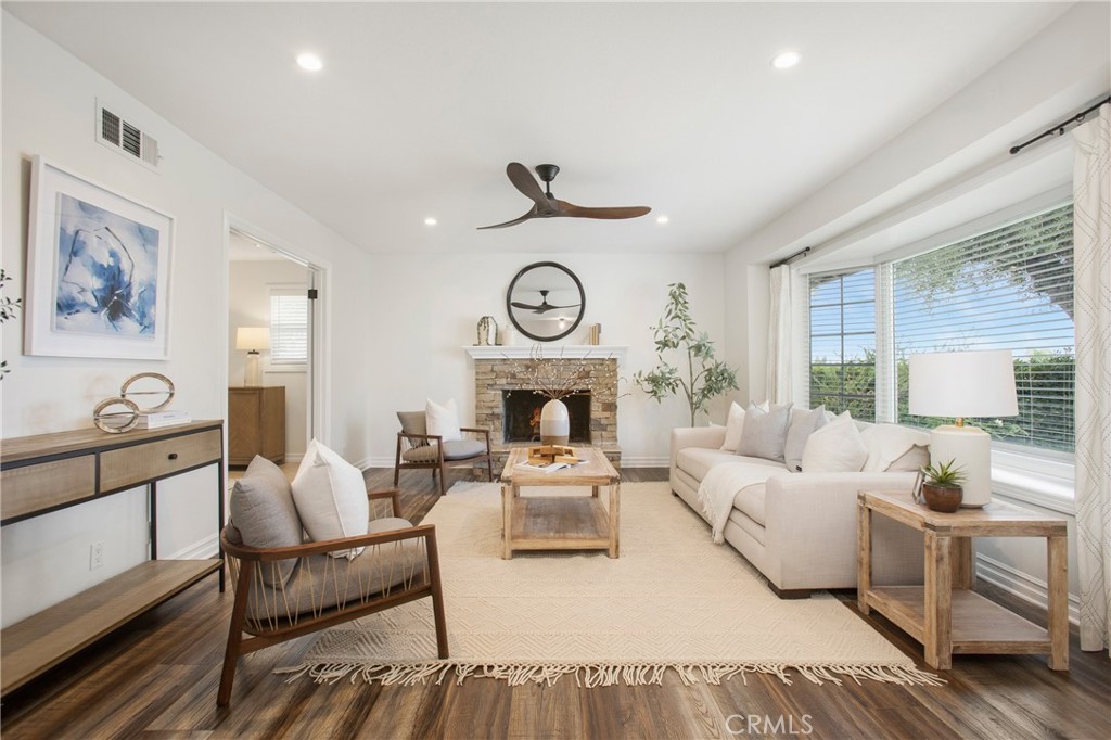 Beautiful living area with bay window and a fireplace. - 19622 Crestknoll Drive, Yorba Linda CA 92886 - photo 1