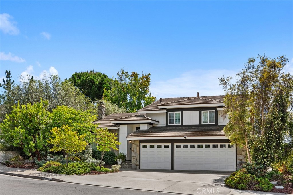 Lots of parking with this 3 car garage and driveway. - 21674 Calle Alcazar, Yorba Linda CA 92887 - photo 2