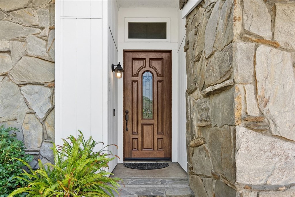 Stunning entrance with stone walk way and inviting front door. - 21674 Calle Alcazar, Yorba Linda CA 92887 - photo 3