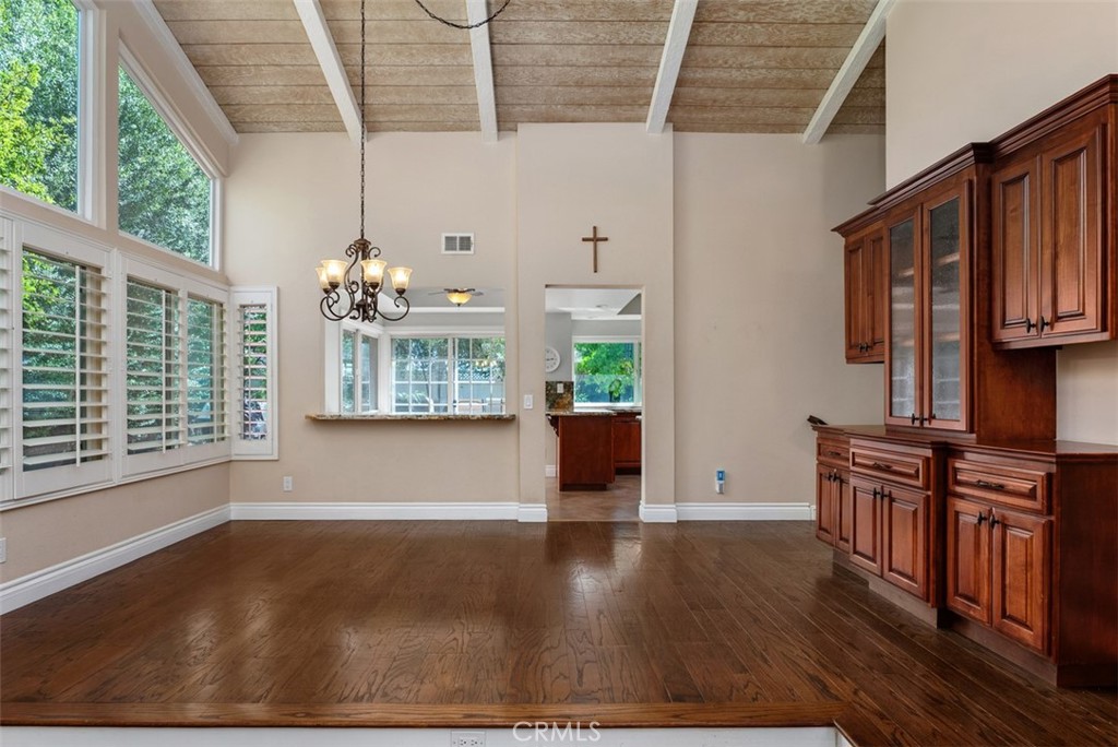 Lots of natural light with these large windows. Note the built in cabinet in the dining room. - 21674 Calle Alcazar, Yorba Linda CA 92887 - photo 7