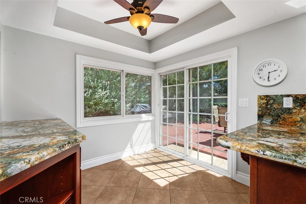 The sunny kitchen nook looking out to the relaxing backyard. - 21674 Calle Alcazar, Yorba Linda CA 92887 - photo 12