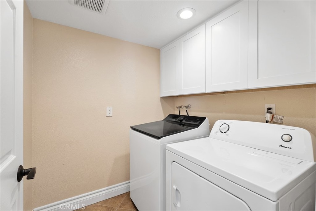 Inside laundry with washer & dryer. - 21674 Calle Alcazar, Yorba Linda CA 92887 - photo 15