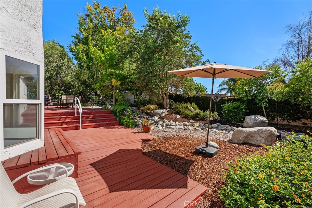 More of the backyard. This section is outside the den. - 21674 Calle Alcazar, Yorba Linda CA 92887 - photo 28