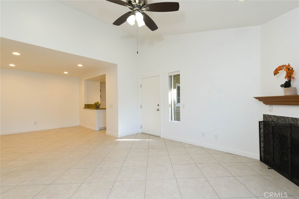 The kitchen is adjacent to the dining room. - 23472 Cambridge Road 297, Yorba Linda CA 92887 - photo 7