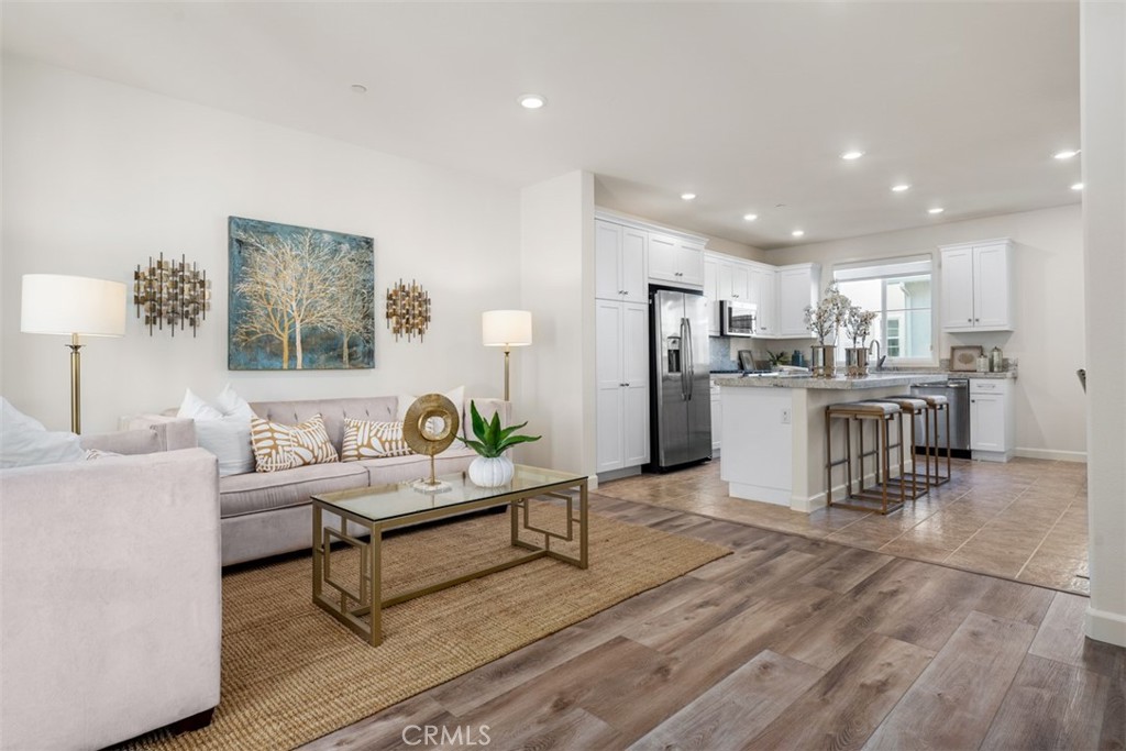 Open, clean and crisp living and kitchen area - 4317 Canyon Coral, Yorba Linda CA 92886 - photo 1