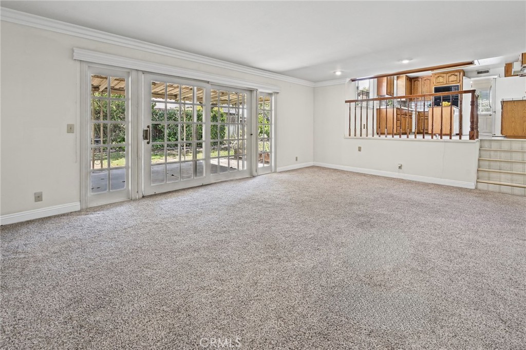 The family room looking out to the backyard. - 5062 W Knoll Drive, Yorba Linda CA 92886 - photo 20