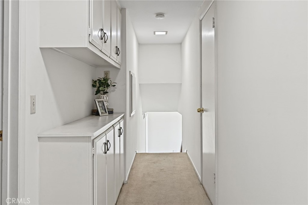Upstairs hallway with storage cabinets - 5062 W Knoll Drive, Yorba Linda CA 92886 - photo 32